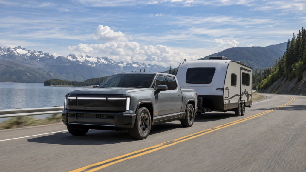 Extended-range electric pickup towing a travel trailer on a long highway trip